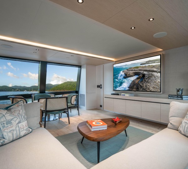 Large sofa and TV in main salon