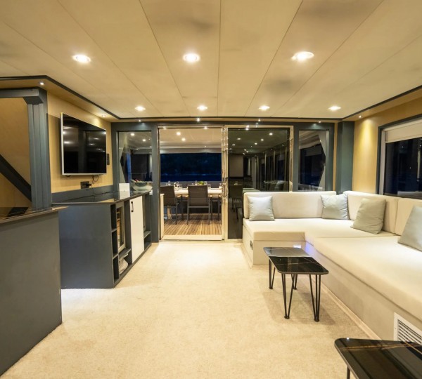Main Salon At Night View To Aft Deck