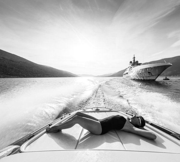 70m Heesen Yacht B&W Sunbathing