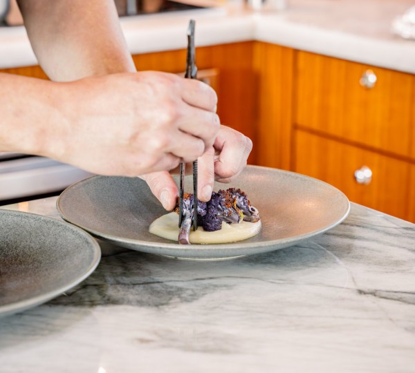 Chef Plating On A Yacht