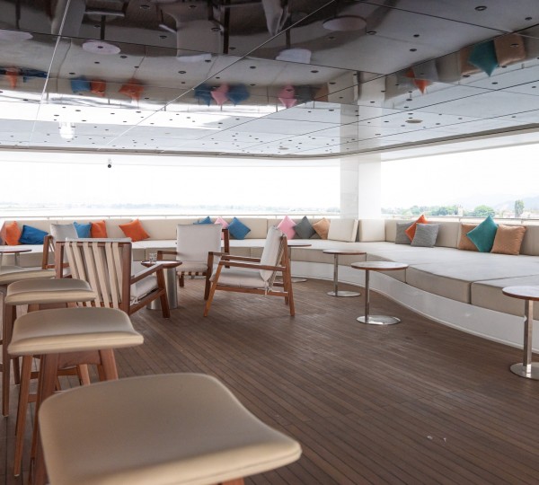 Bar stools and lounge furniture on deck