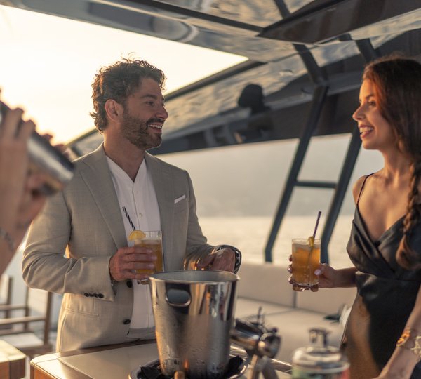Enjoying A Drink On Deck