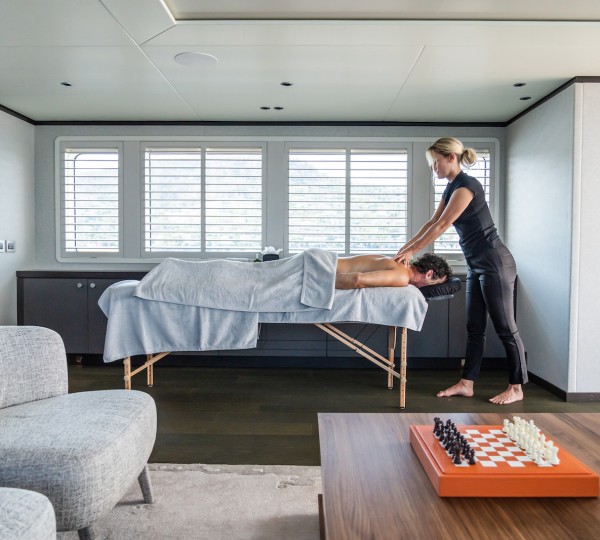 Enjoying A Massage Aboard A Yacht
