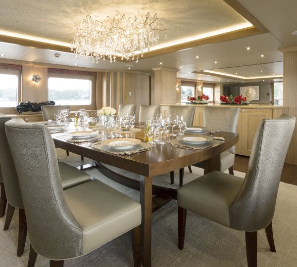 Formal Dining Area With Beautiful Light Fitting