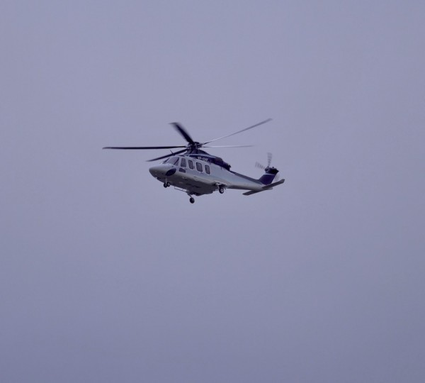 Helicopter Arriving At The Shipyard  
