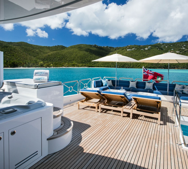 Jacuzzi And Sunbathing Area
