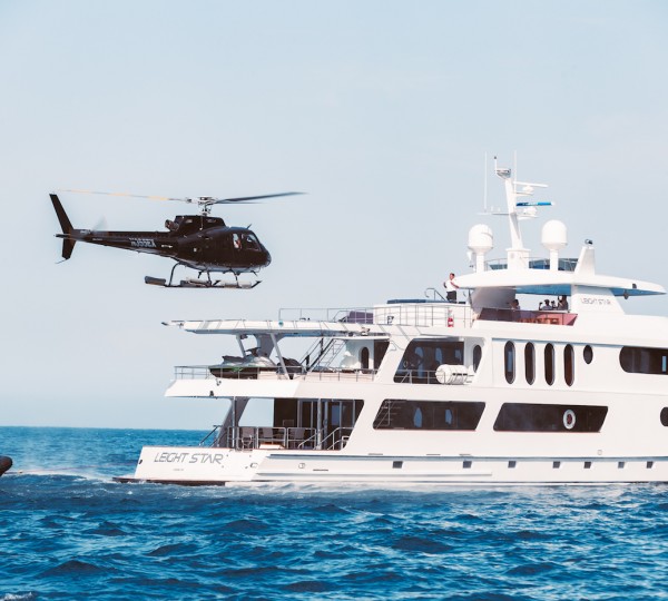 LEIGHT STAR Yacht With Helicopter Arriving On Board