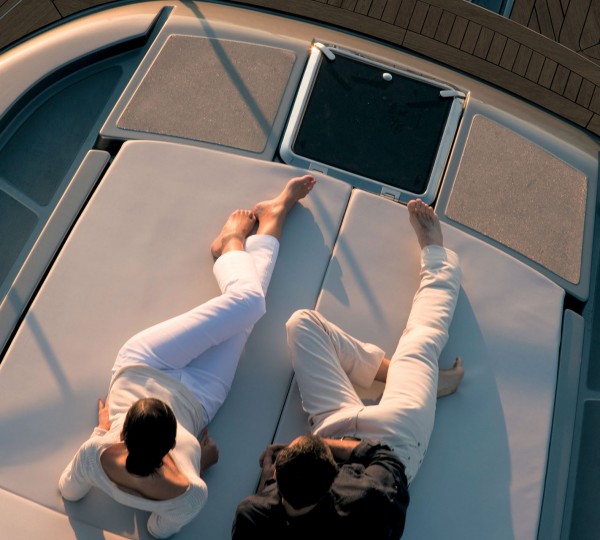 Relaxing On The Foredeck Sunpads