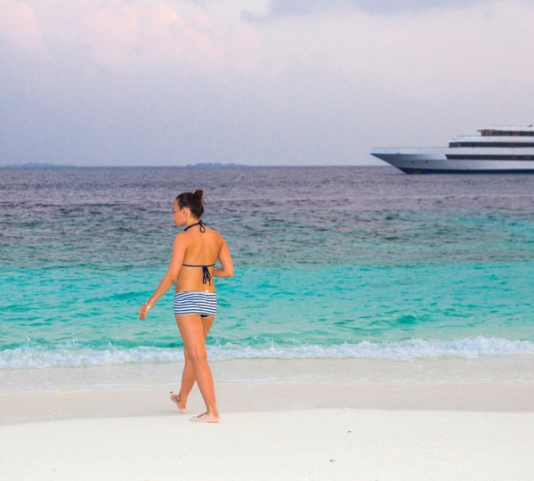 Ritrella And A Woman On A Beach