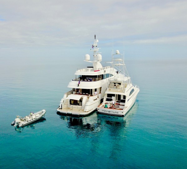 With Tender And Fishing Boat