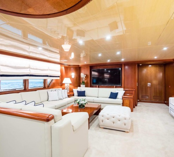 A Large Living Room With A Large Open Ceilin