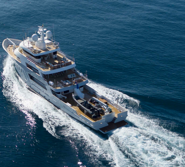 Aerial Fo The Yacht Running - Aft View