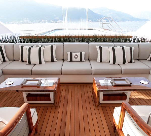 Aft Deck Lounging With A Pool In The Background