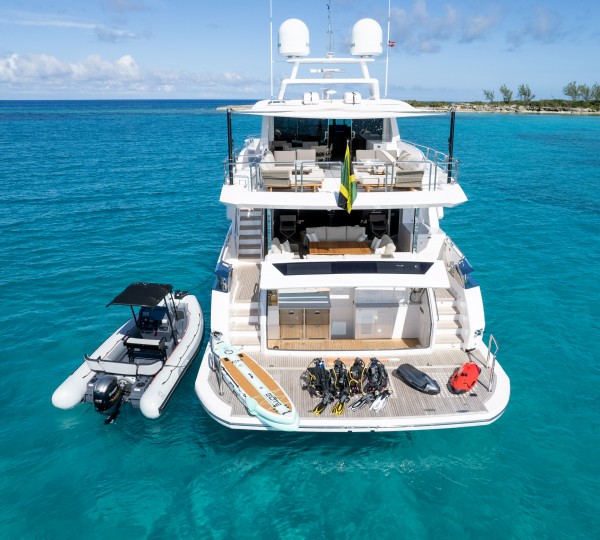 Aft View Of The Yacht With Tender And Water Toys