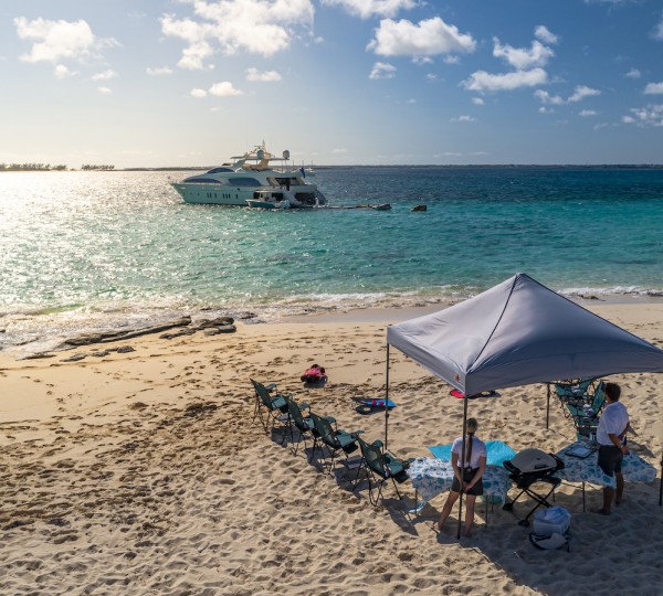 Beach Set Up With Yacht SWEET EMOCEAN