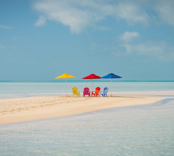 Chairs And Umbrellas On The Beach
