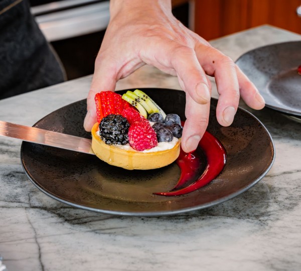 Chef Plating A Berry Tart