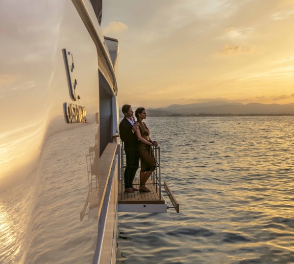 Couple On A Superyacht Balcony