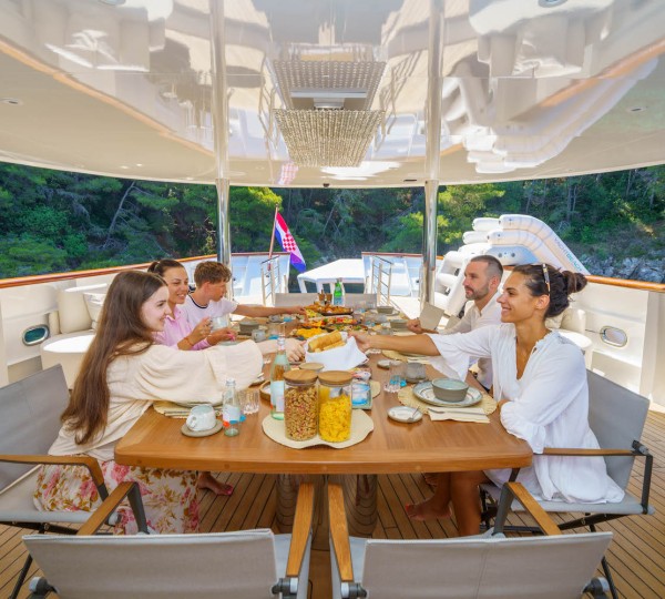 Enjoying A Breakfast On  A Yacht
