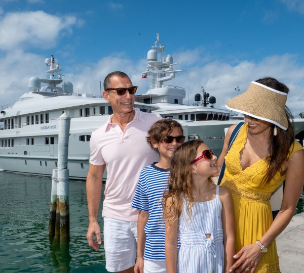 Family Near The Yacht Oceanos