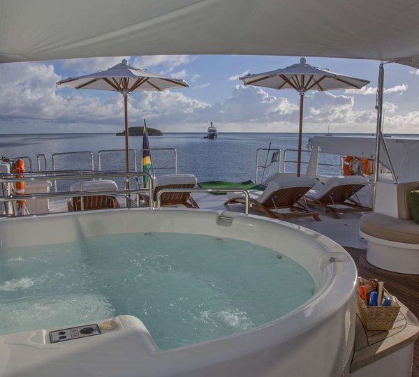 Jacuzzi And Sunbathing Area