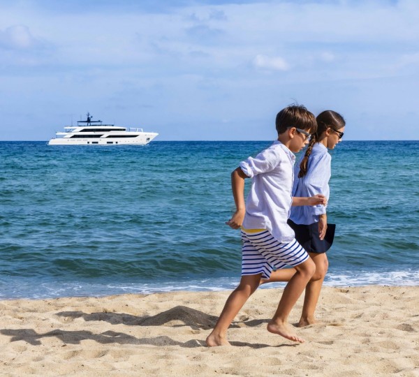 Kids Running On A Beach
