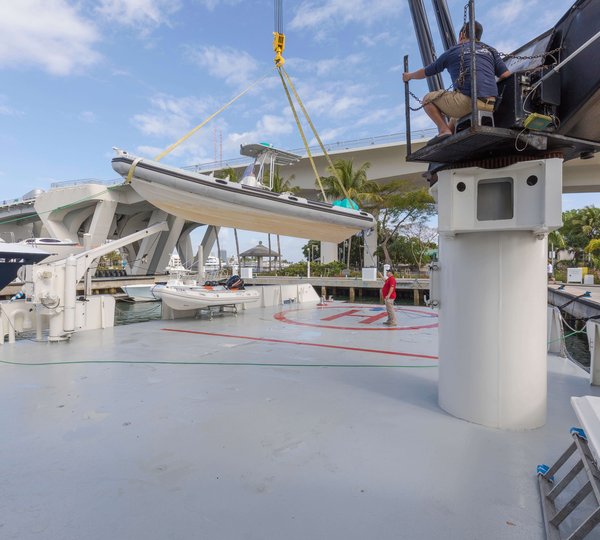 Lowering Tender On Helipad