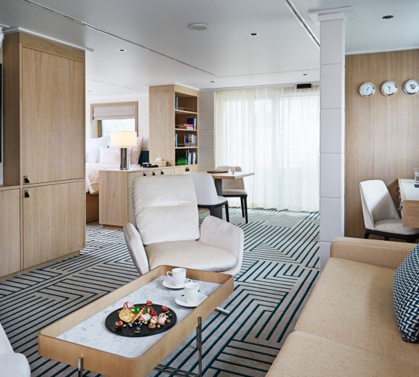 Luxury Master Cabin With Seating Area And Desk