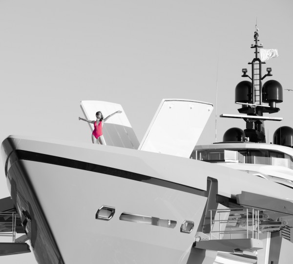 Model On A Bow Of A Mega Yacht