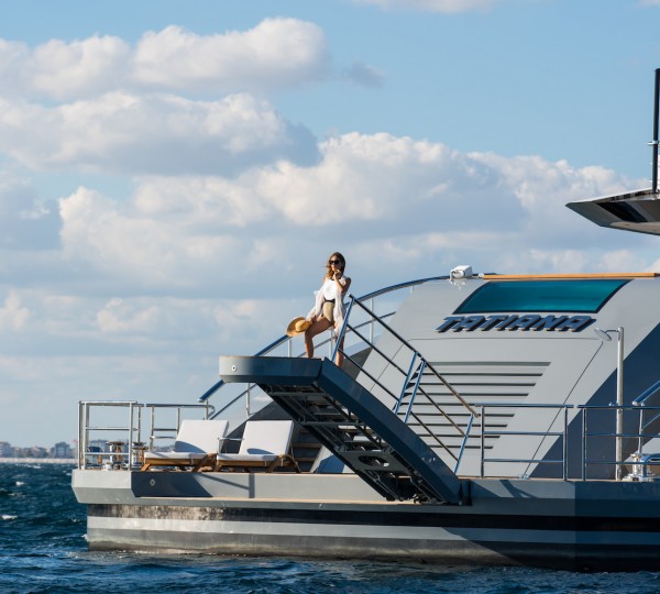 Model On A Passarelle Of A Yacht