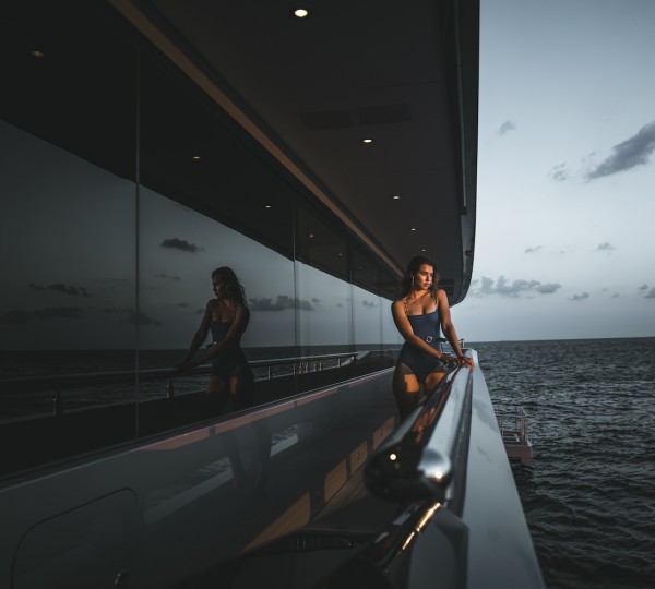 Model On A Yacht Side Deck
