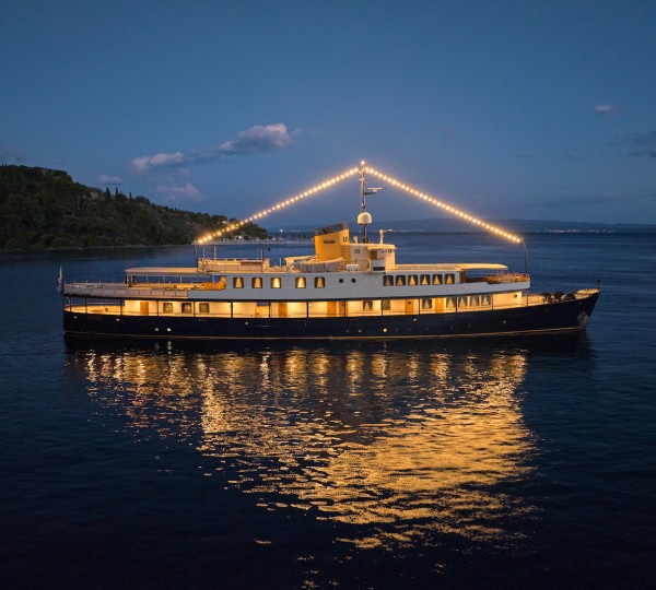 Profile Of The Yacht In The Evening With Lights