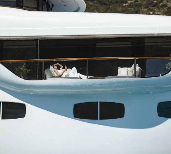 Relaxing On A Balcony On A Yacht