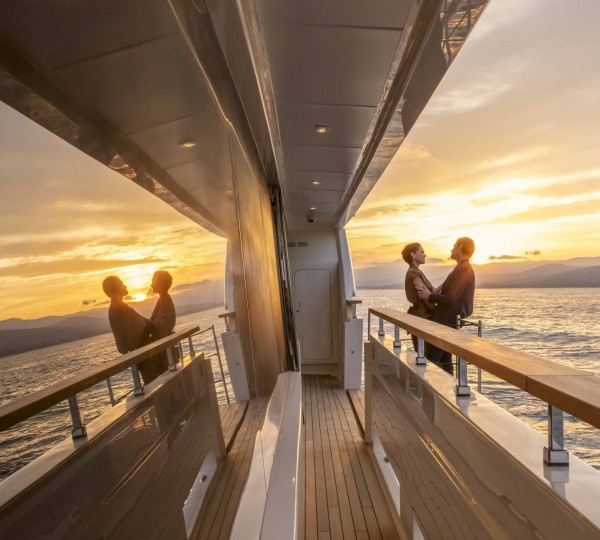 Romantic Couple On A Yacht Sunset