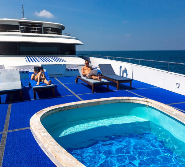Sunbathing Next To Jacuzzi