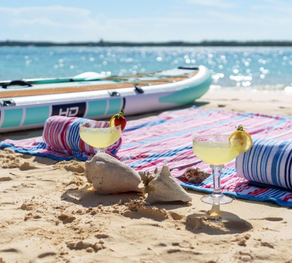 Sunbathing On The Beach
