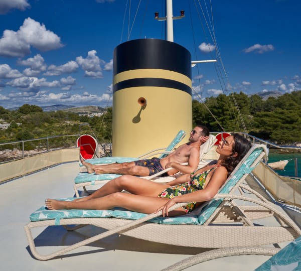Sunbathing On The Yacht
