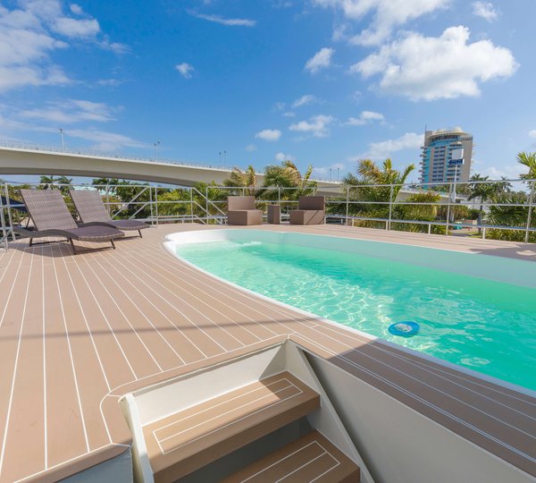 Swimming Pool With Sun Loungers