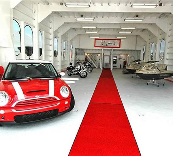 Tenders And Car In Garage