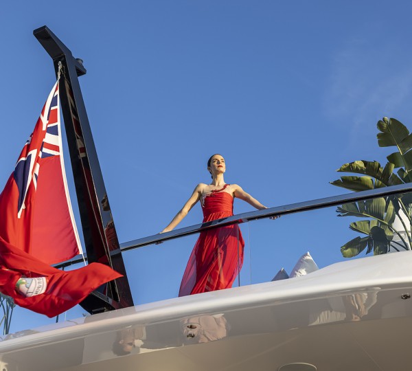 Woman In Red Dress On A Yacht - Lifestyle