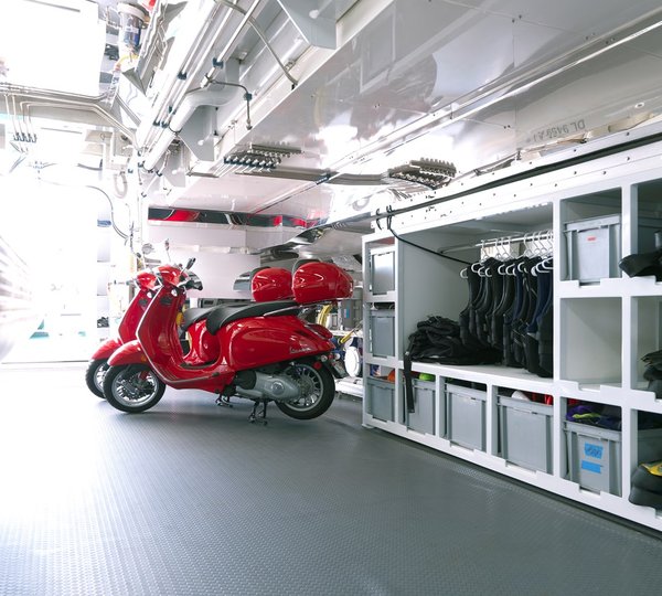 Garage With Vespas, Tender And Other Water Toys And Equipment