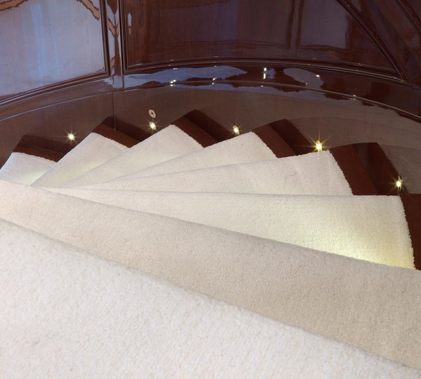 Stairwell Plush Carpet And Mahogany Wood Detail