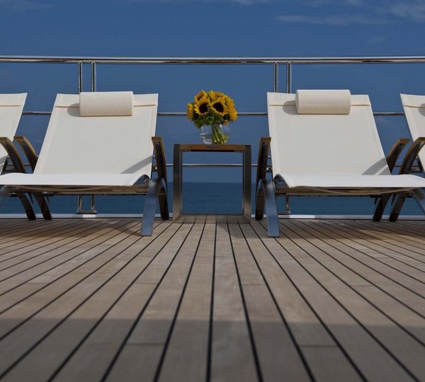 Sunshine Lounging Aboard Yacht HUNTRESS