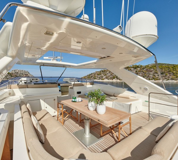 Lounge And Deck Helm On Flybridge Deck
