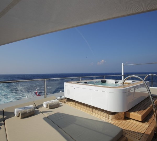 Jacuzzi Pool With Sunshine Pads Upon The Aft Deck On Yacht GRACE E