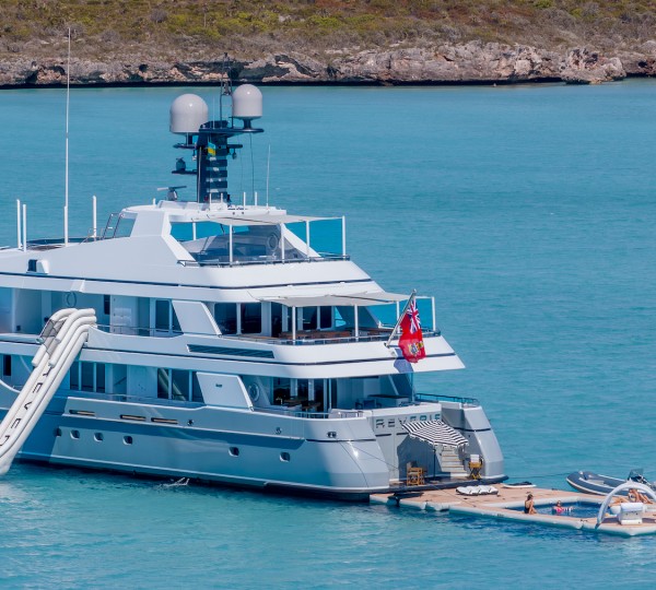 Luxury Yacht REVERIE At Anchor With The Inflatable Pool And Sunbathing Area