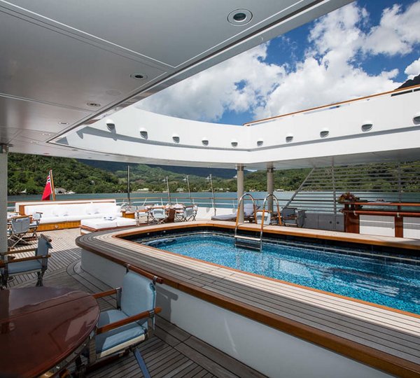 Massive Swimming Pool And Aft Deck With Bar And Seating