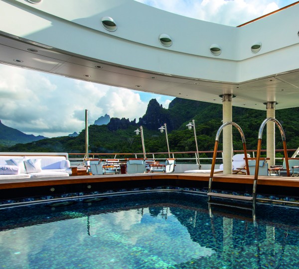 Enjoying Tahiti's beauty from the mosaic-tile swimming pool