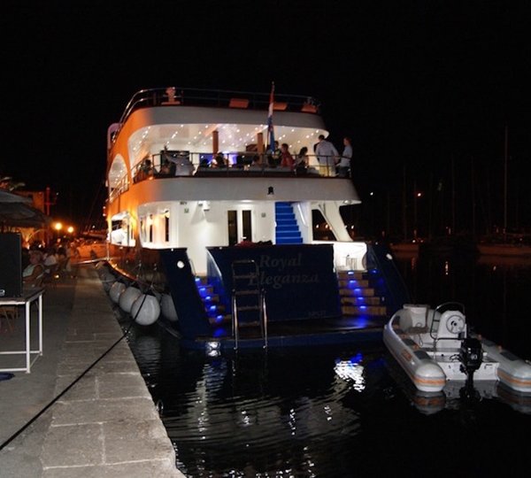 Royal Eleganza docked at night 