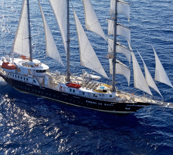 Sailing Yacht Running On Waves